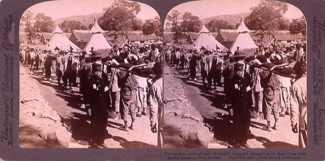 作品画像:The terrible price of war―wounded Japanese brought in by Red Cross from fearfulAssaults PortArthur.