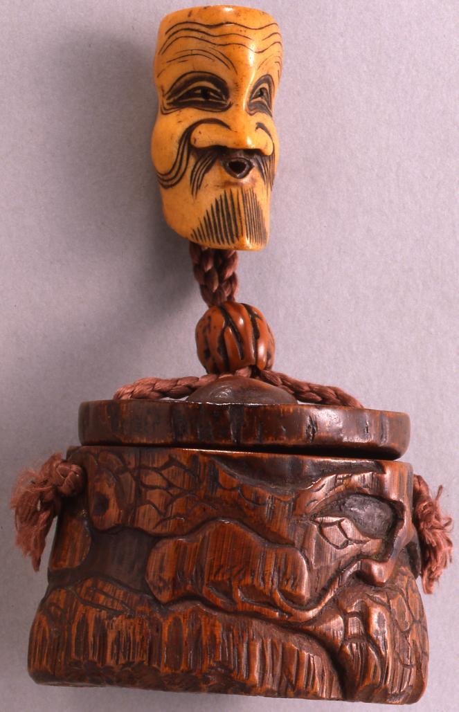 Tobacco Caddy with Carving of Figure Beneath a Pine Tree
