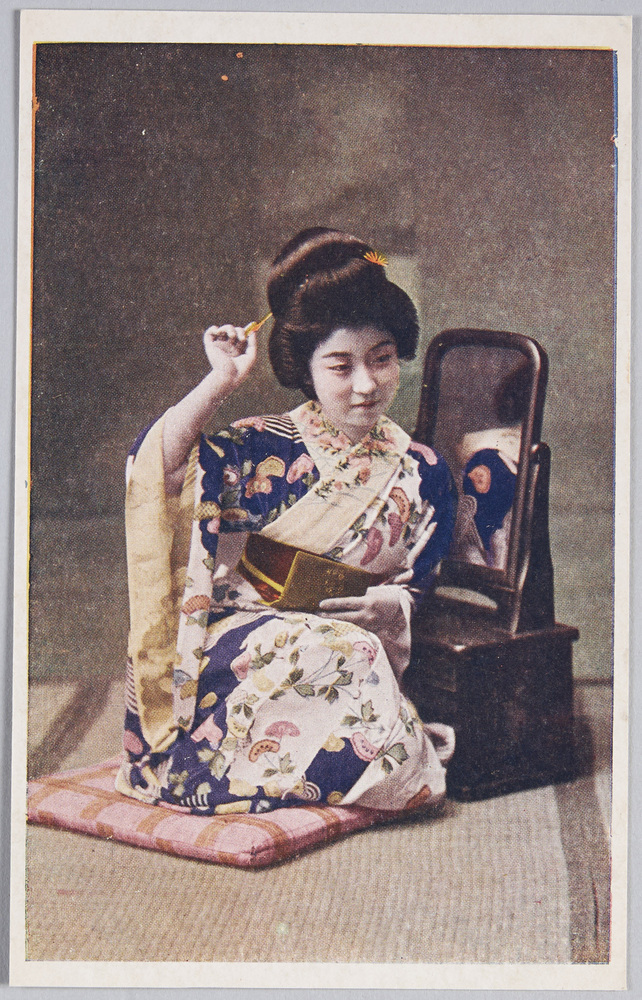 作品画像:簪を挿す和装女性