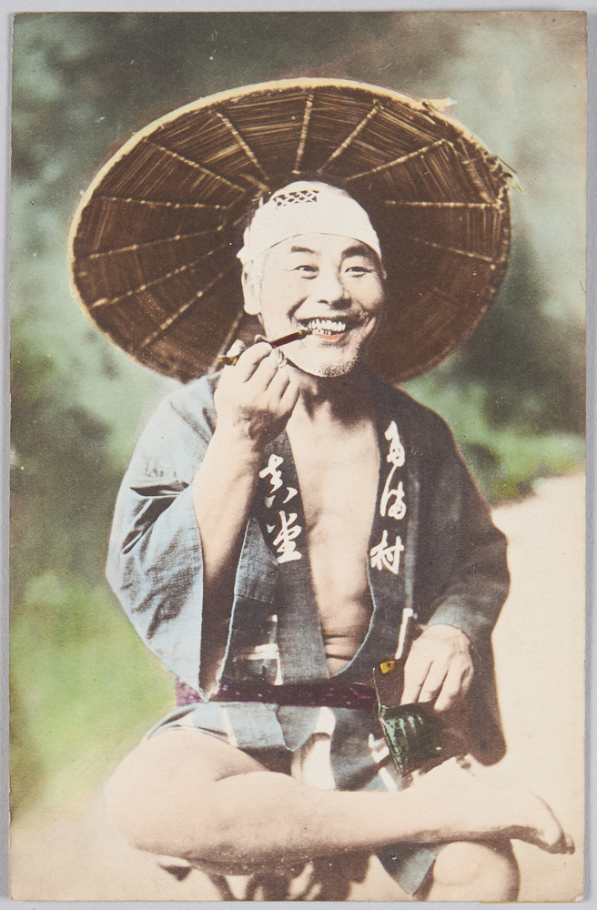 作品画像:煙管をくわえる男性