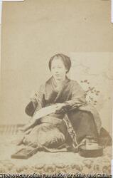 作品画像:(文を書く女性)