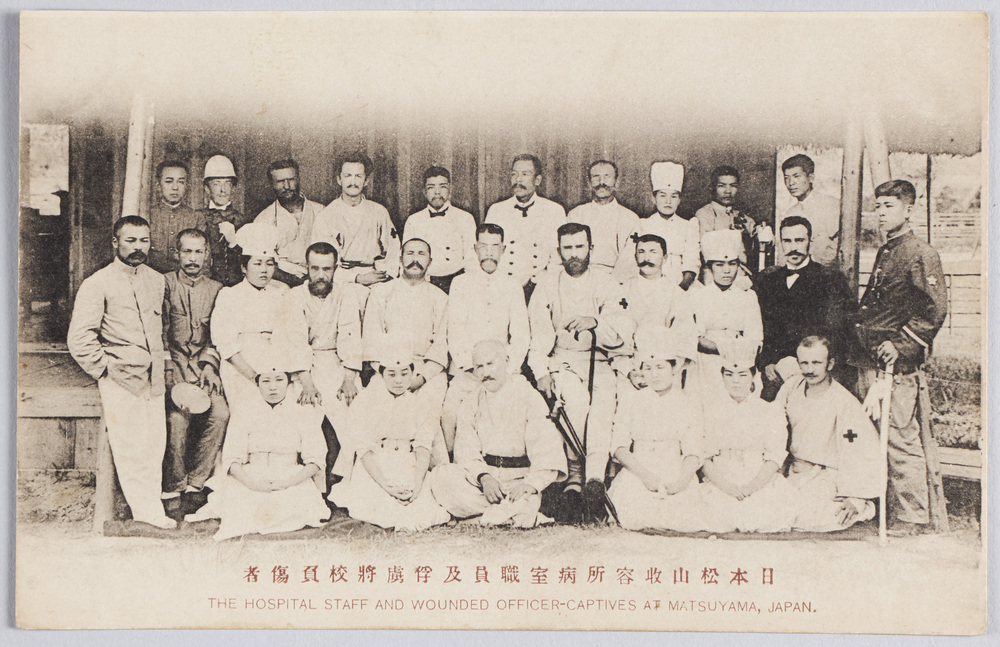 作品画像：日本松山収容所病室職員及俘虜将校負傷者　THE　HOSPITAL　STAFF　AND　WOUNDED　OFFICER-CAPTIVES　AT　MATSUYAMA,　JAPAN.