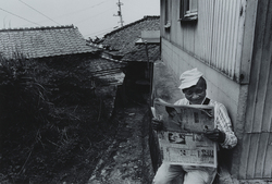 作品画像：島の新聞配達人